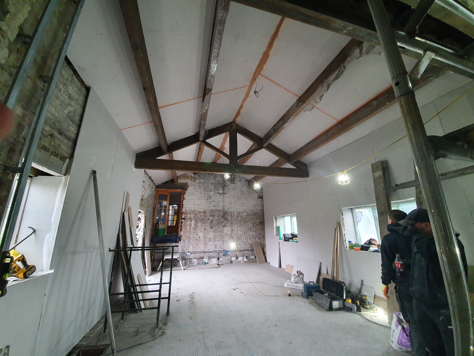 Renovation boarded around beams